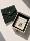 Collier motif avec breloque